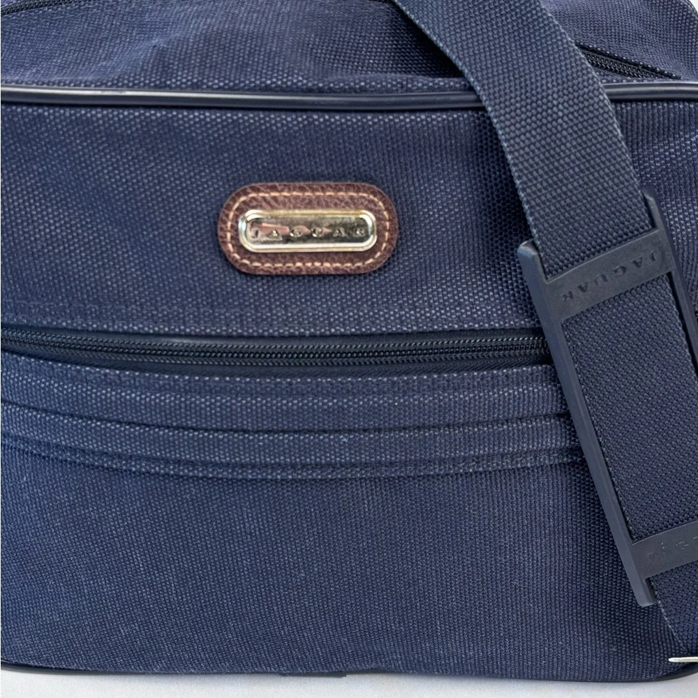 Jaguar Blue Travel Bag with Durable Fabric and Leather Accents. Nice Condition!